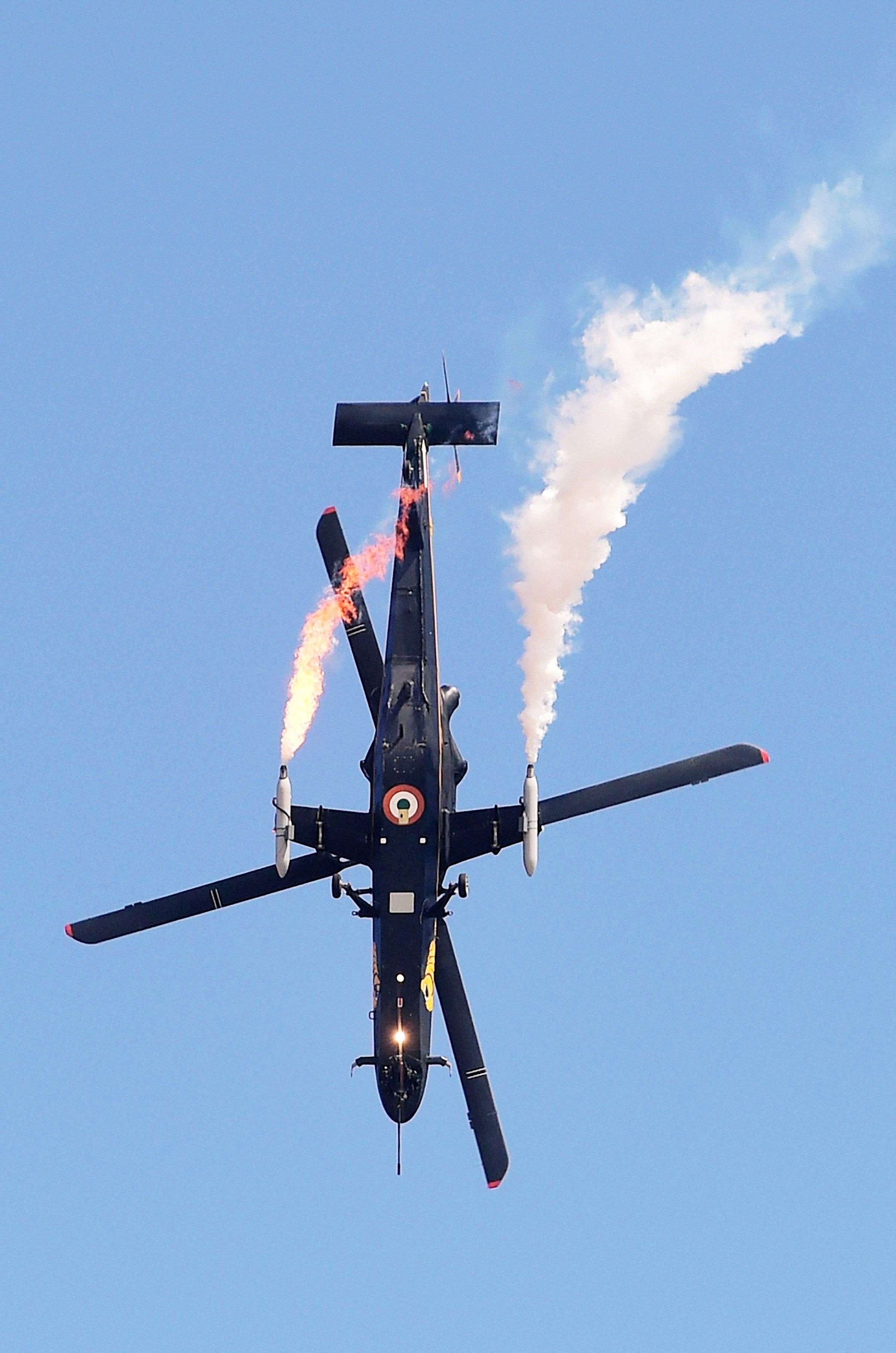 Indian Air Forces’ light combat helicopter 'Rudra' performs during the inauguration of the Aero India at Yelhanka Air Base in Bengaluru. (Shailendra Bhojak – PTI)