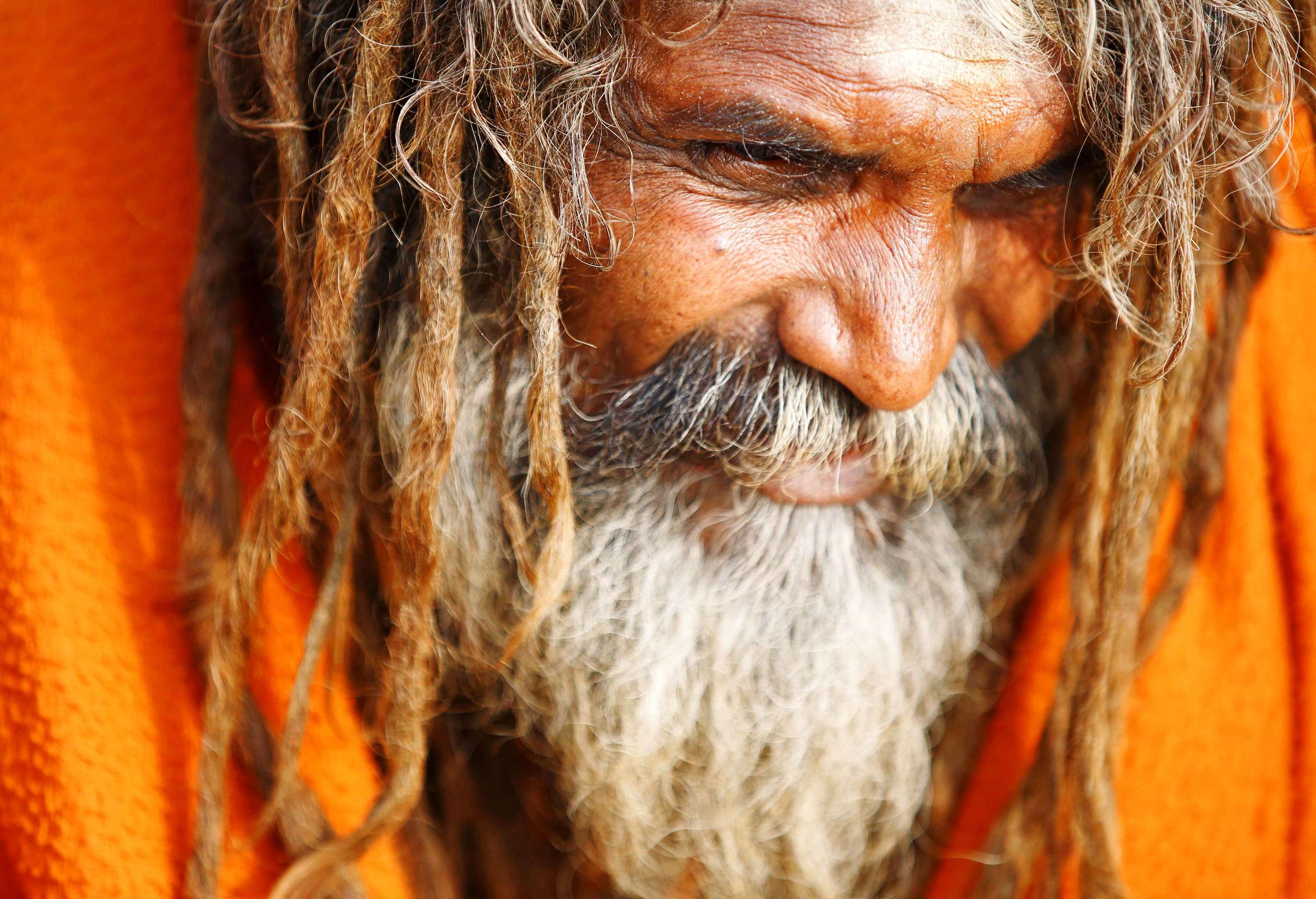 A sadhu is pictured as he sits inside the premises of Pashupatinath Temple in Kathmandu. (REUTERS/Navesh Chitrakar)