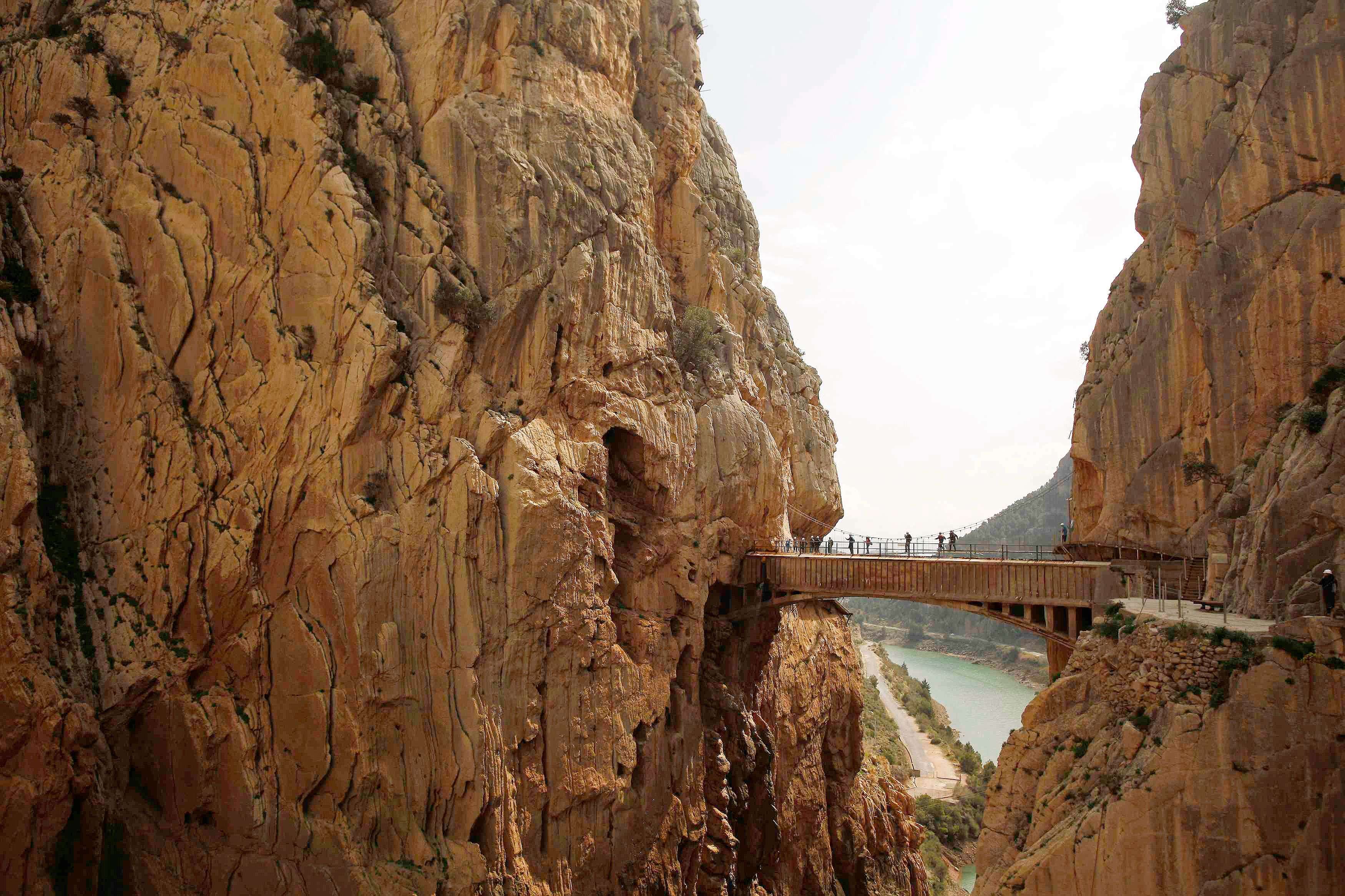 Journalists walk along the new Caminito del Rey (The King's little pathway) in El Chorro-Alora