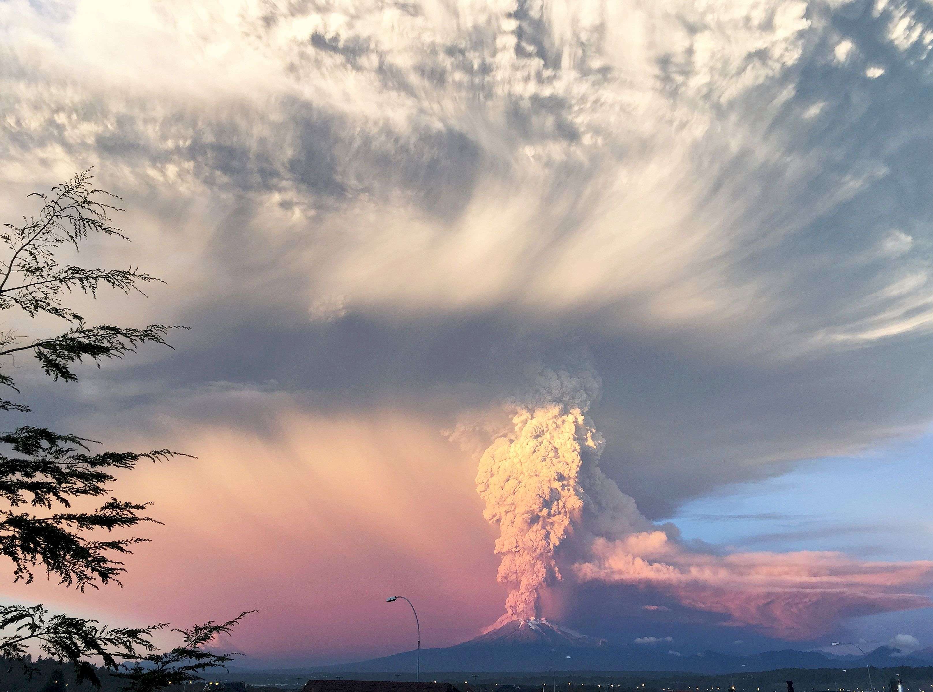 Smoke and ash rise from the Calbuco volcano as seen from the city of Puerto Montt