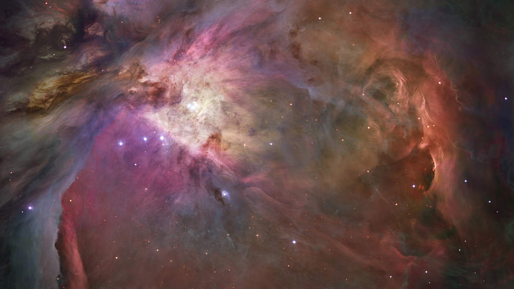 Orion Nebula: This dramatic image offers a peek inside a cavern of roiling dust and gas where thousands of stars are forming. More than 3,000 stars of various sizes appear in this image of the Orion Nebula. Some of them have never been seen in visible light. Ultraviolet light unleashed by the four central stars is carving a cavity in the nebula and disrupting the growth of hundreds of smaller stars. (Courtesy: http://hubblesite.org/)