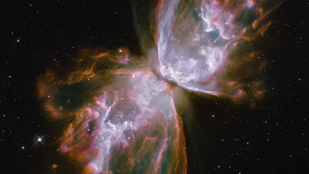 Butterfly Nebula, NGC 6302: What resemble dainty butterfly wings are actually roiling cauldrons of gas heated to more than 36,000 degrees Fahrenheit. The gas is tearing across space at more than 600,000 miles an hour—fast enough to travel from Earth to the Moon in 24 minutes. A dying star is at the center of this fury. It has ejected its envelope of gases and is now unleashing a stream of ultraviolet radiation that is making the cast-off material glow. (Courtesy: http://hubblesite.org/)