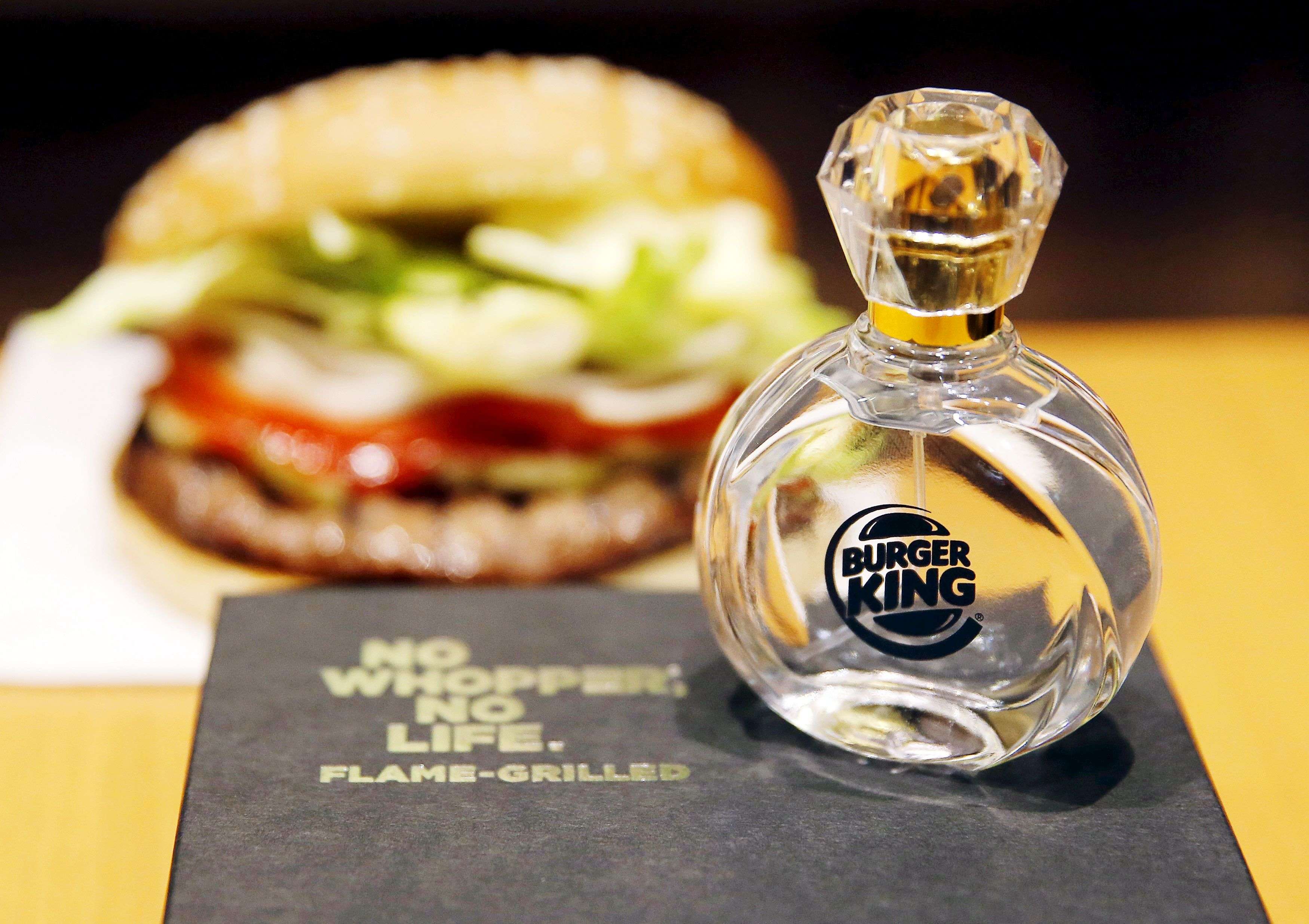 A Whopper of an idea: If you live in Japan you will soon have the chance to spritz yourself with eau de Burger King. Burger King Japan's perfume, which smells like a flame-grilled burger patty and is named 'Flame Grilled Fragrance', is seen in front of a whopper at their store as part of the company's April Fool campaign in Tokyo. (Reuters/Toru Hanai) 
