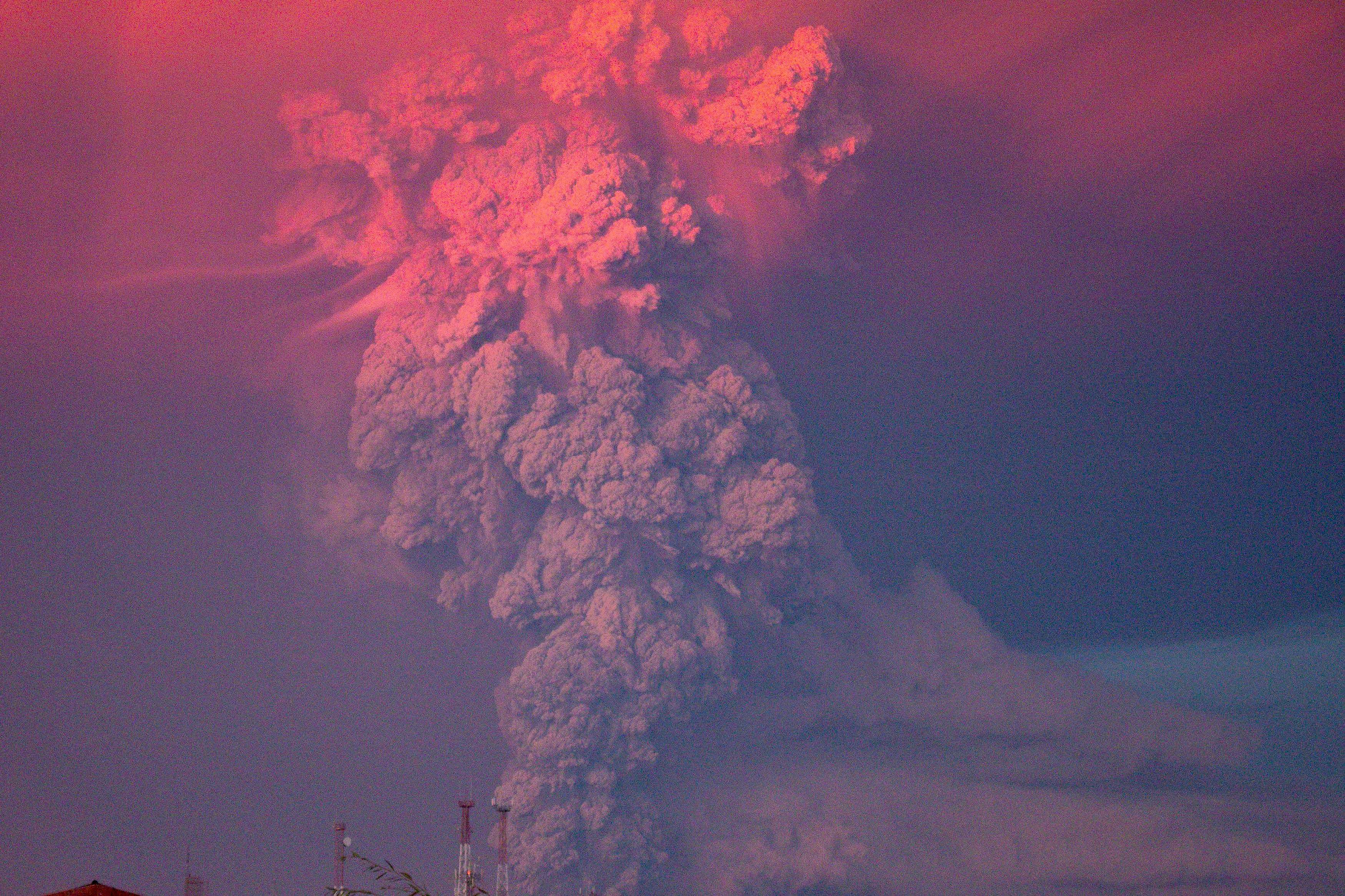 Smoke and ash rise from the Calbuco volcano as seen from the city of Puerto Montt