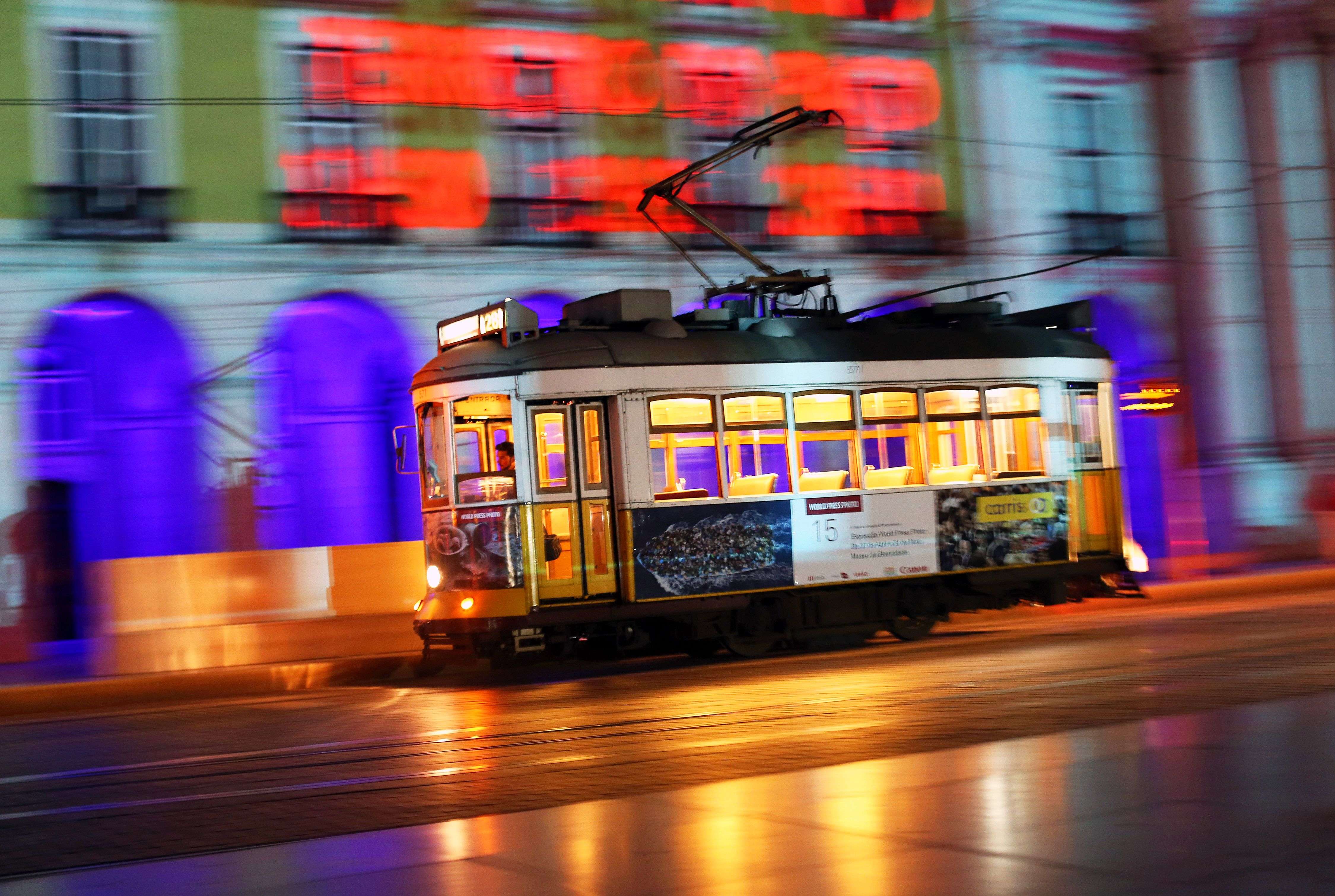 A tram driver steers a tram at the Comercio square in Lisbon. The tram is a very common public transport among locals and visitors to move within the Portuguese capital.(AP/Francisco Seco) 