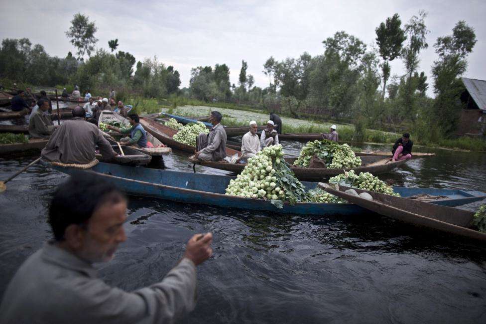 Kashmiri vegetable vendors assemble at a floating market on Dal Lake in Srinagar. (REUTERS/Ahmad Masood/Files)