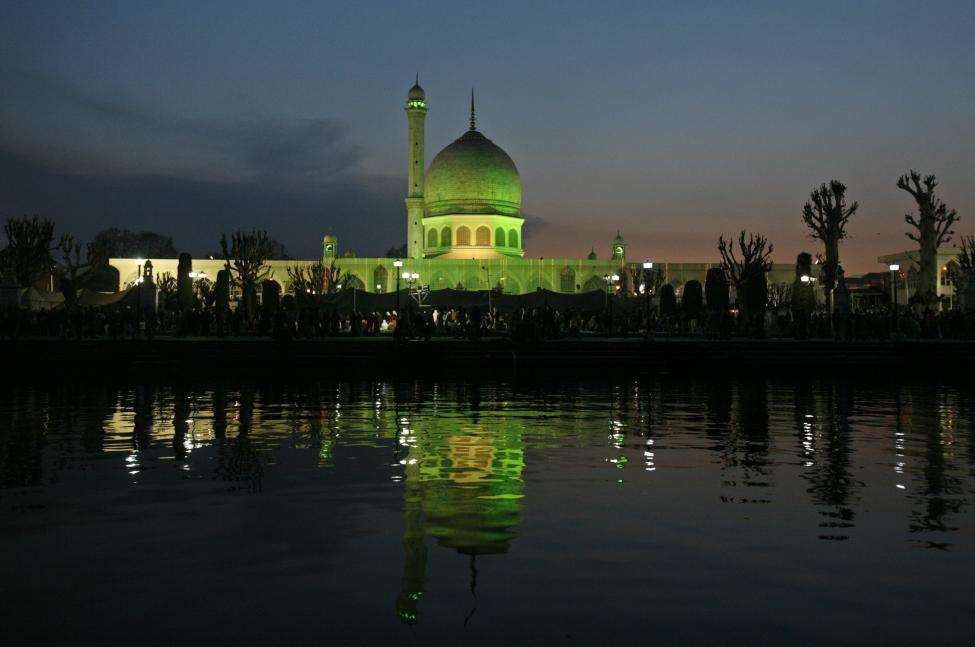 Kashmir's holiest shrine Hazratbal is seen illuminated from Dal Lake on the eve of Eid-e-Milad in Srinagar. (REUTERS/Fayaz Kabli/Files)