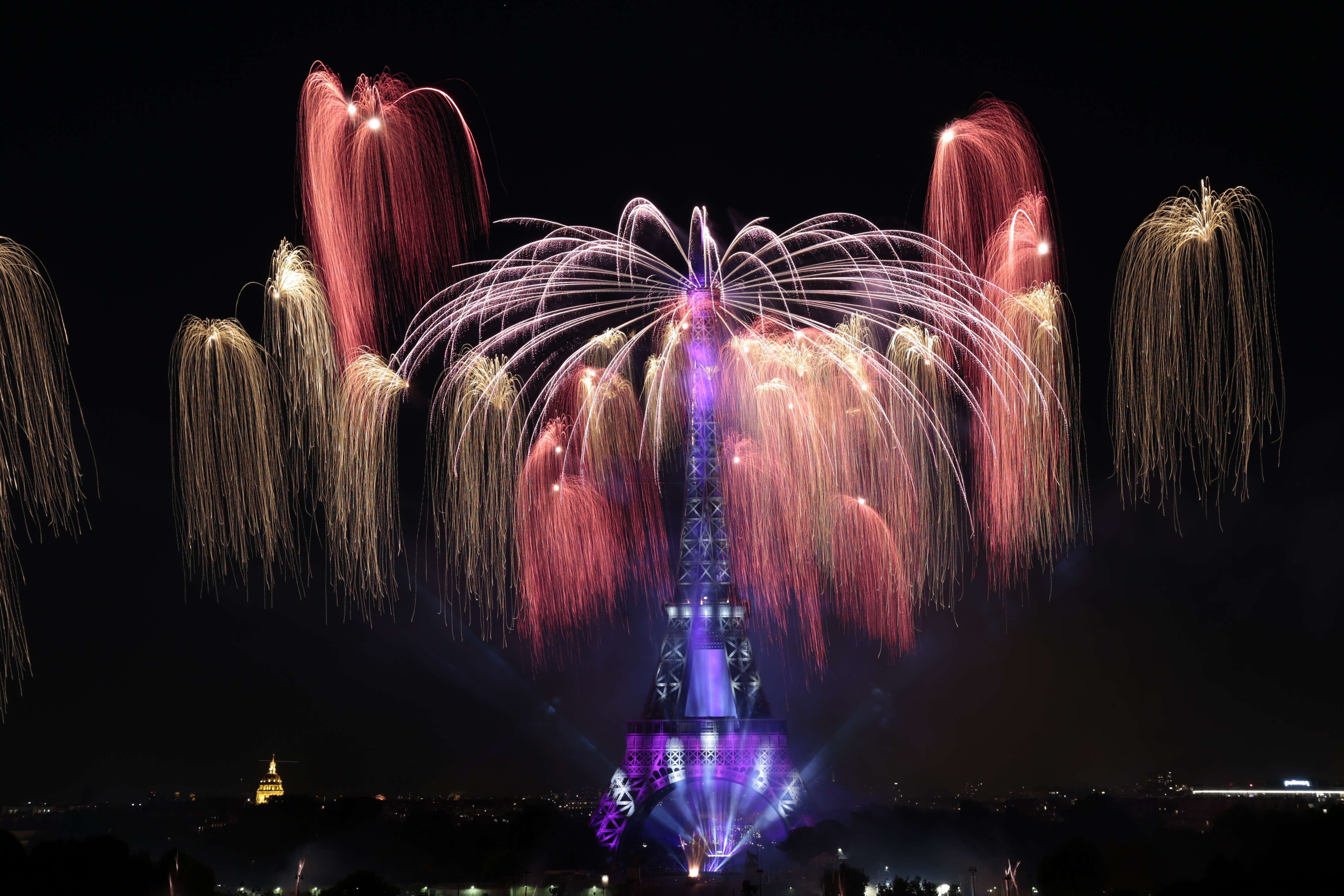 Fireworks light the skies above the Eiffel Tower in the French capital Paris, on July 14 as part of France's annual Bastille Day celebrations. (AFP/ Joel Saget)