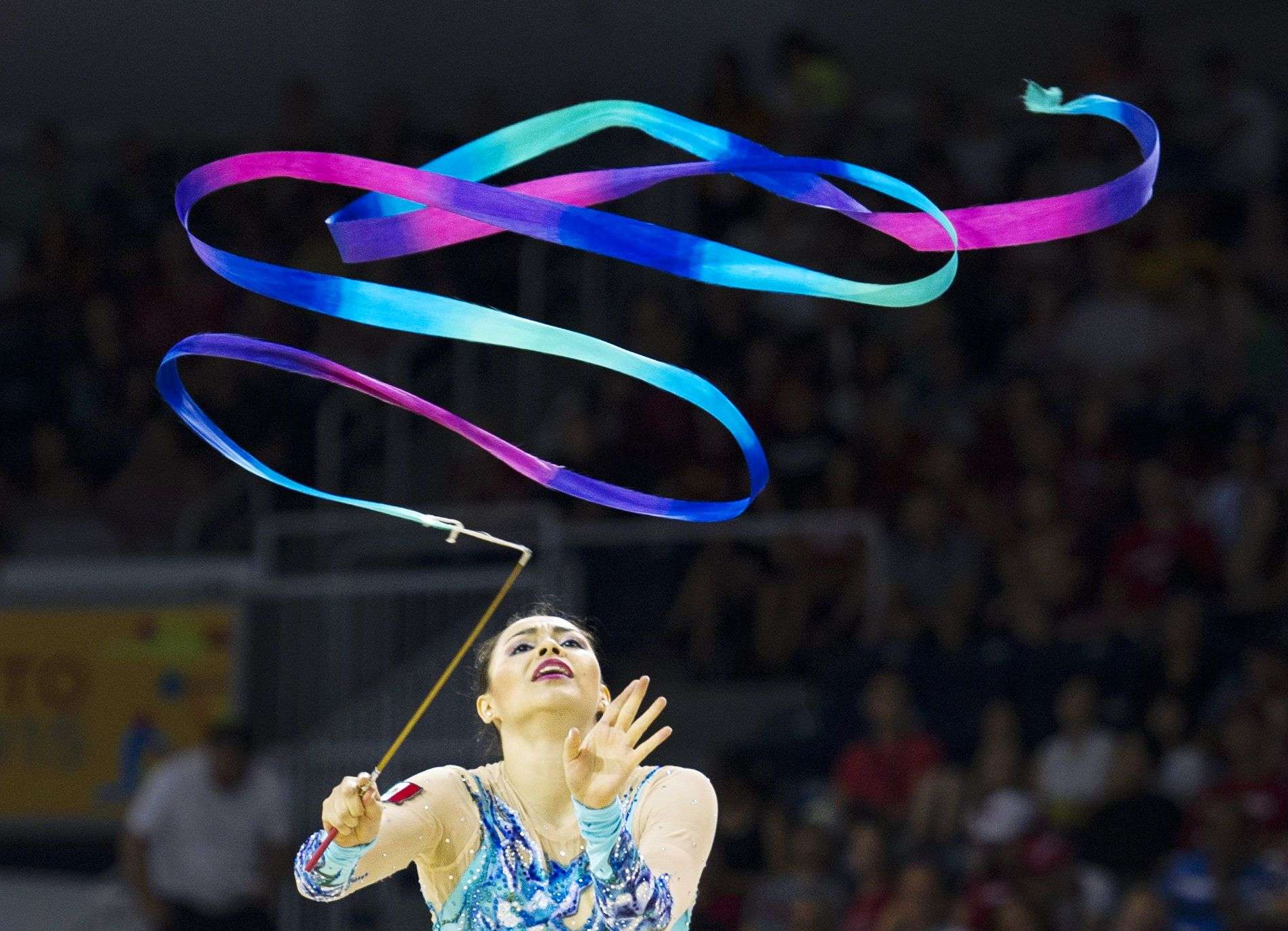 Rut Castillo of Mexico competes in the ribbon rotation in the rythmic gymnastics individual all-around at the Pan American Games in Toronto, Canada. (AFP/ Kevin Van Paasen)  