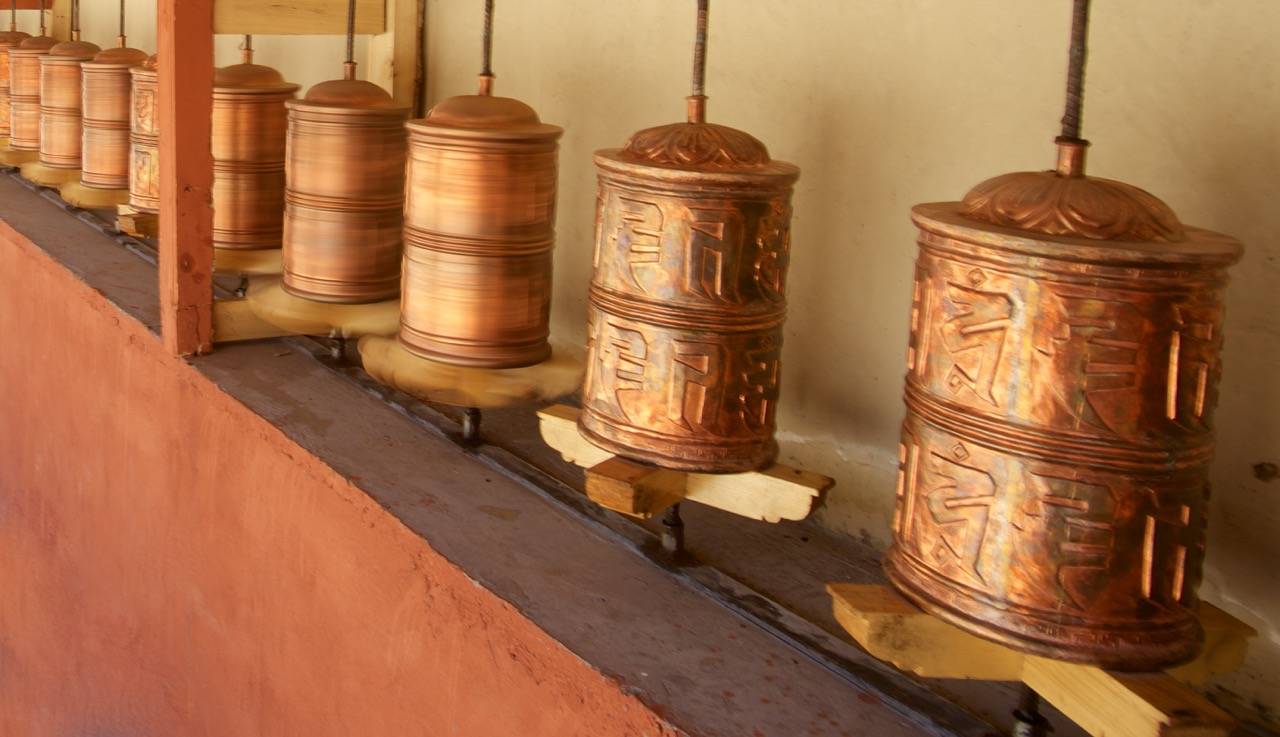 Prayer Wheels: Some prayers (stationery prayer wheels in the image) remain unanswered. That doesn’t mean we should stop praying
