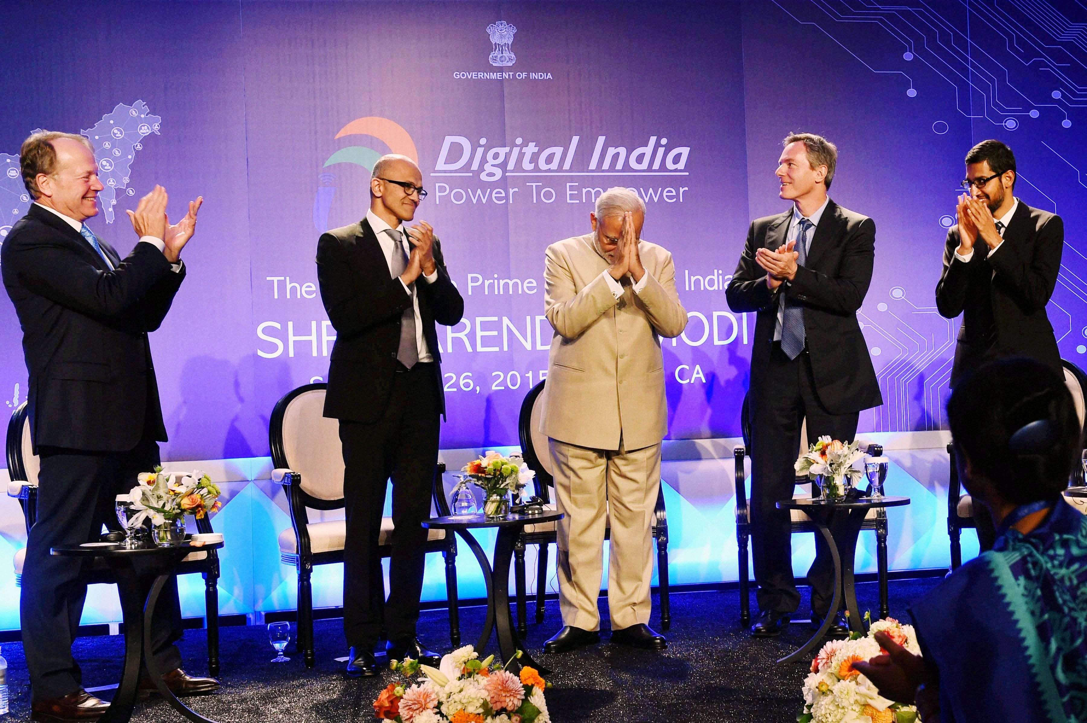 San Jose: Prime Minister Narendra Modi with Microsoft CEO Satya Nadella (2nd L), John T. Chambers, Executive Chairman of Cisco, Paul E. Jacobs, Executive Chairman of Qualcomm and Goggle CEO Sundar Pichai (R) during the Digital India and Digital Technology dinner function in San Jose on Saturday. PTI Photo by Subhav Shukla    (PTI9_27_2015_000085A)