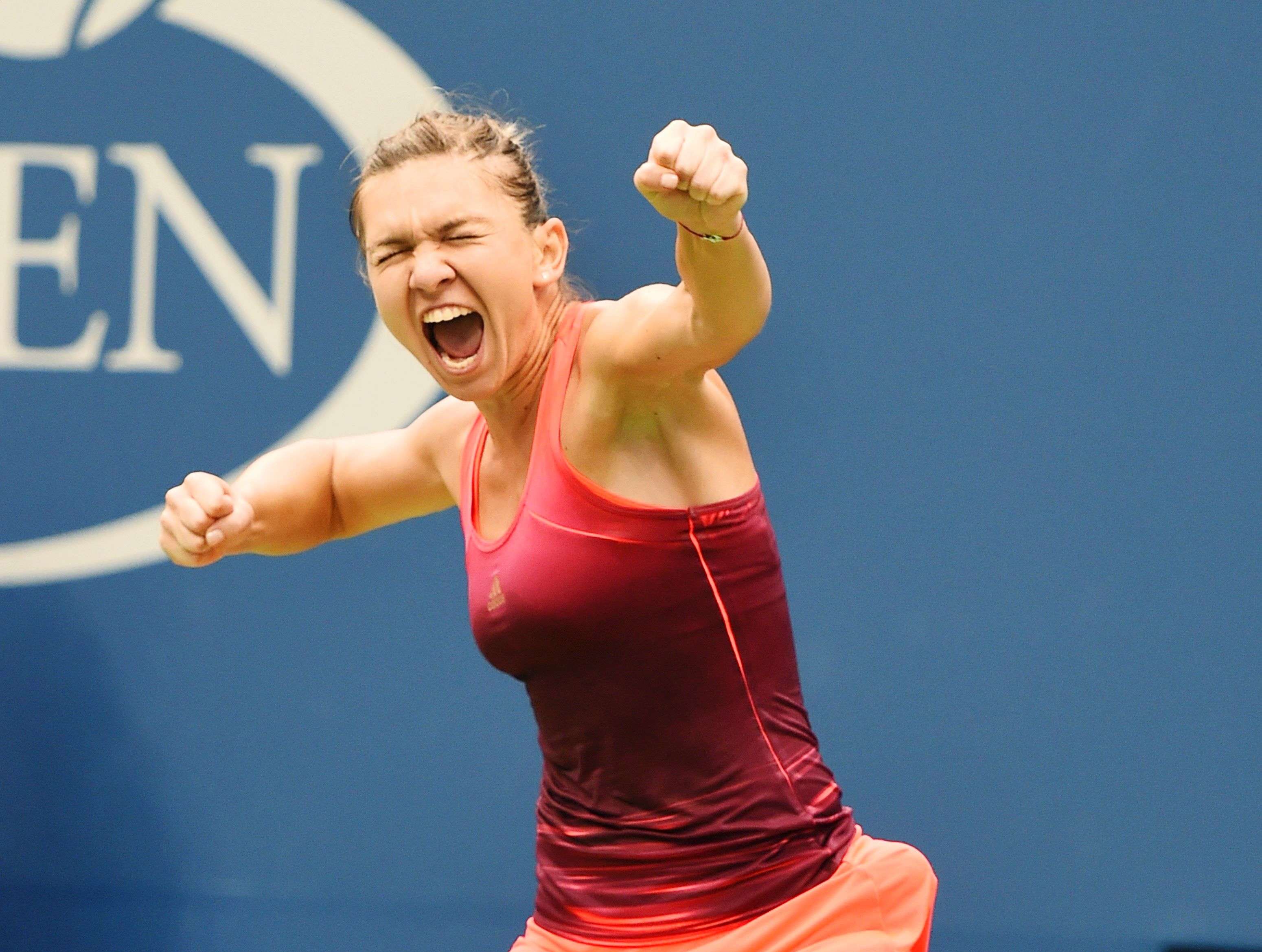 Simona Halep of Romania celebrates match point against Victoria Azarenka of Belarus during their 2015 US Open  Women's Singles-Quarterfinals at the USTA Billie Jean King National Tennis Center September 9, 2015  in New York.  AFP PHOTO/  TIMOTHY  A. CLARY