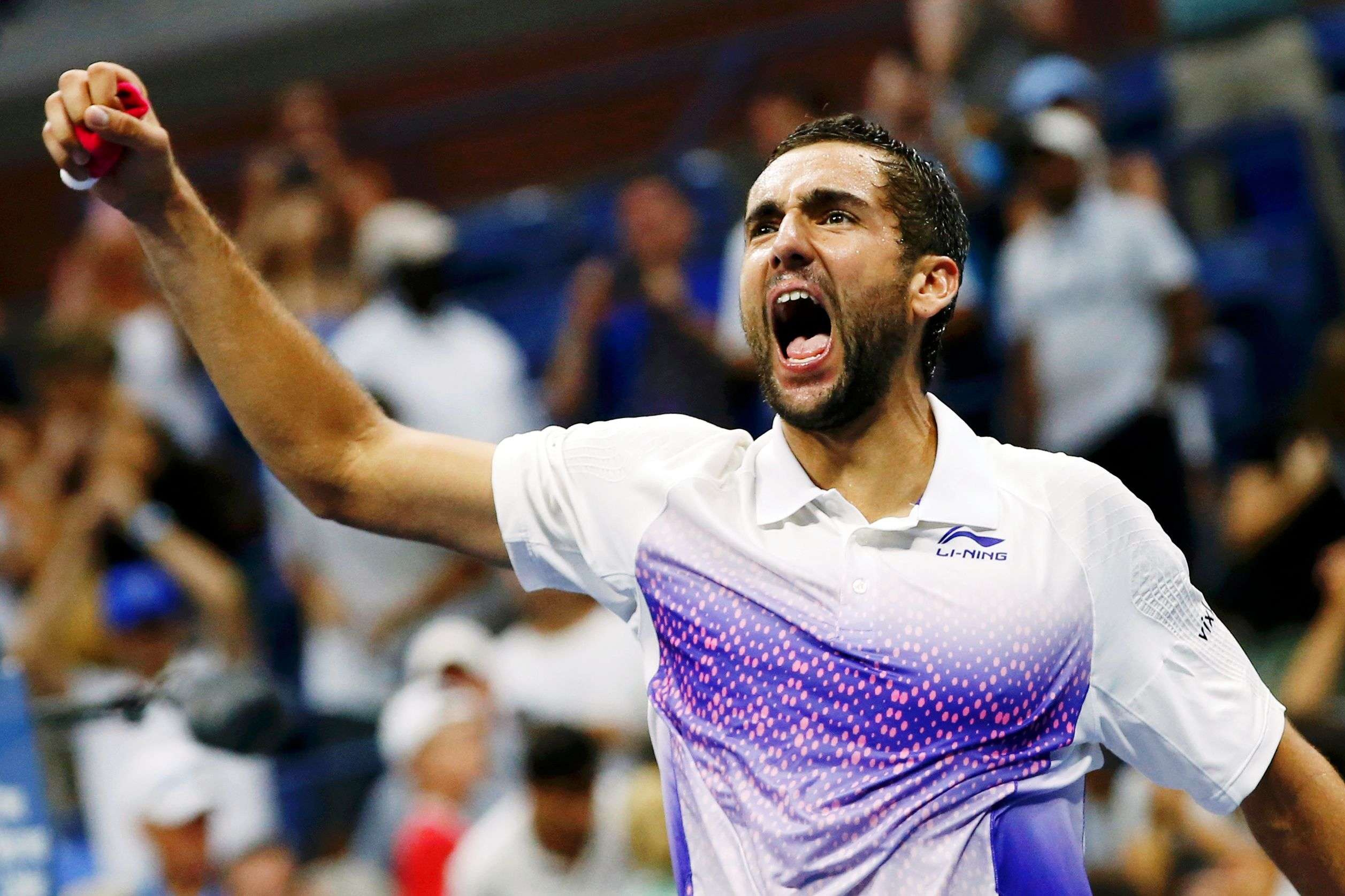 Marin Cilic of Croatia celebrates after defeating Jo-Wilfried Tsonga of France in five sets during their quarterfinals match at the U.S. Open Championships tennis tournament in New York, September 8, 2015.      REUTERS/Mike Segar