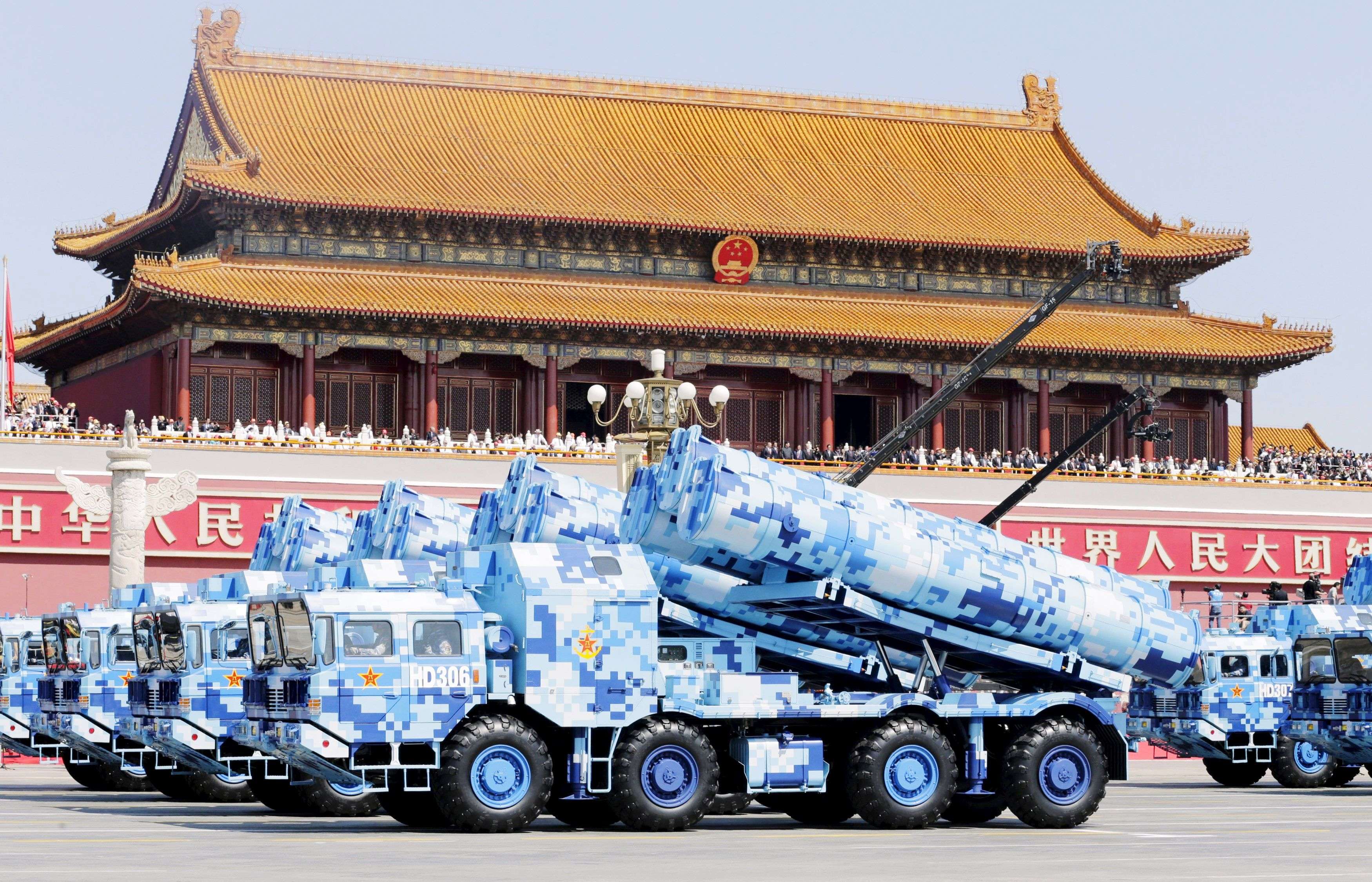 Military vehicles carrying shore-to-ship missiles drive past the Tiananmen Gate during a military parade to mark the 70th anniversary of the end of World War Two, in Beijing, China, September 3, 2015. REUTERS/Jason Lee