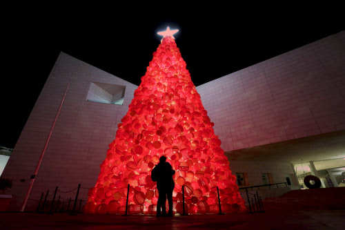 A Christmas tree made out of plastic bins and plastic hampers outside the Museum of History in Monterrey, Mexico (Photo Courtesy: Daniel Becerril / Reuters)