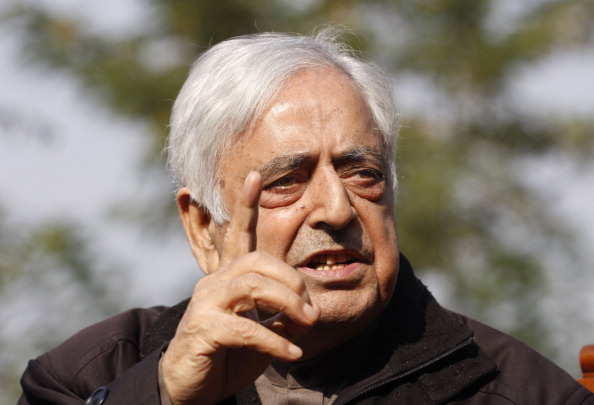 SRINAGAR, INDIA - OCTOBER 28: Peoples Democratic Party Chief Mufti Mohammad Sayeed addressing a press conference regarding ceasefire violations along the border by Pakistan at his residence on October 28, 2013 in Srinagar, India. PDP Chief said that issue has to be addressed politically and the two countries have to respect the yearning for peace in J&K. (Photo by Waseem Andrabi/Hindustan Times via Getty Images)