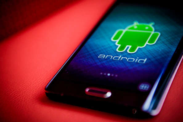 A Samsung Electronics Co. Galaxy Note Edge smartphone running the Android mobile operating system is arranged for a photograph in New York, U.S., on Tuesday, July 28, 2015. A researcher at a security firm revealed a hole in Android's source code that hackers can exploit, if they have a phone's number, with a text. Photographer: Chris Goodney/Bloomberg via Getty Images
