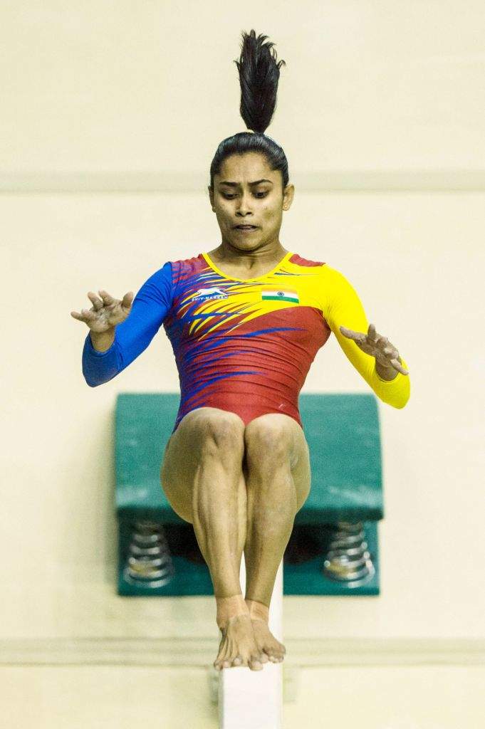 India's Dipa Karmakar performs at the balance beam during the artistic gymnastics test event for the Rio 2016 Olympic Games at the Rio Olympic Arena in the Olympic Park in Rio de Janeiro, Brazil, on April 17, 2016. / AFP PHOTO / YASUYOSHI CHIBA