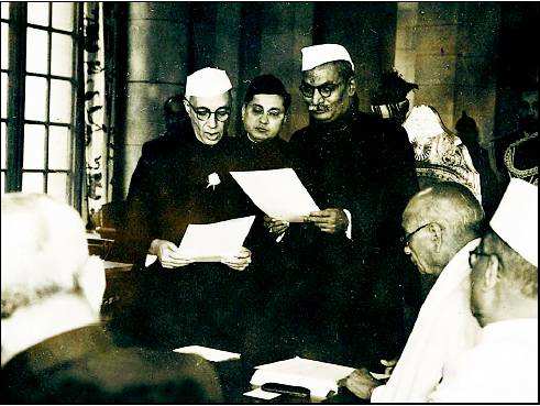 Jawaharlal Nehru being administered oath as Prime Minister of India by President Rajendra Prasad