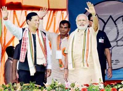 Prime Minister Narendra Modi with Chief Minister designate of Assam, Sarbananda Sonowal