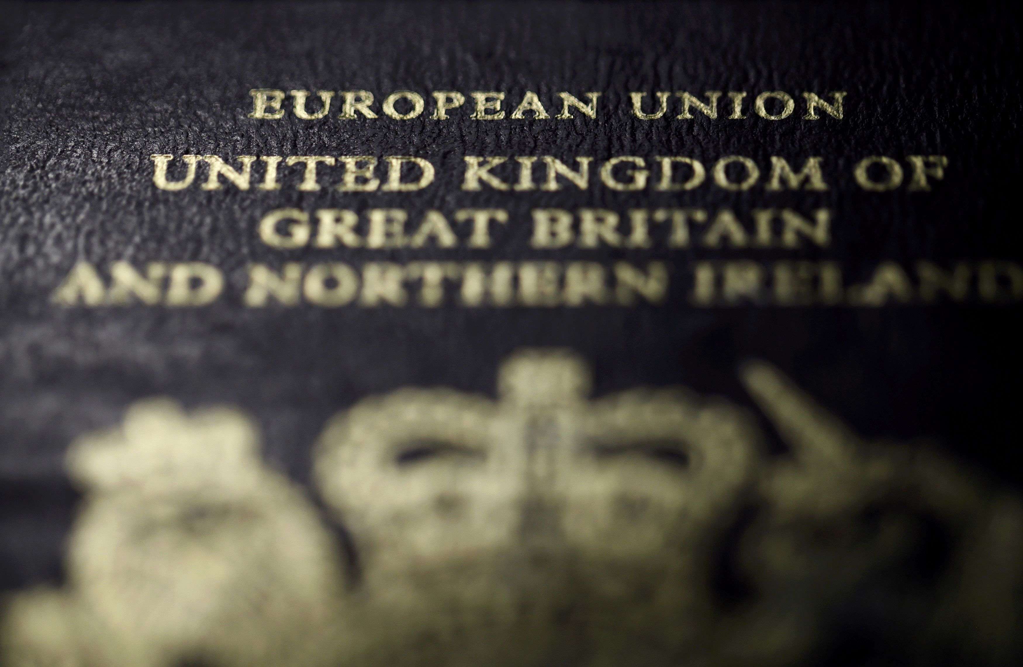 File photo shows the close-up detail of the cover of a European Union British passport pictured in Paris, France,  January 23, 2013. Carmakers and soccer chiefs threw their weight behind the campaign for Britain to stay in the European Union June 20, 2016, as opinion polls showing the "Remain" camp gaining ground buoyed shares and sterling three days ahead of the referendum.  REUTERS/Mal Langsdon/File Photo