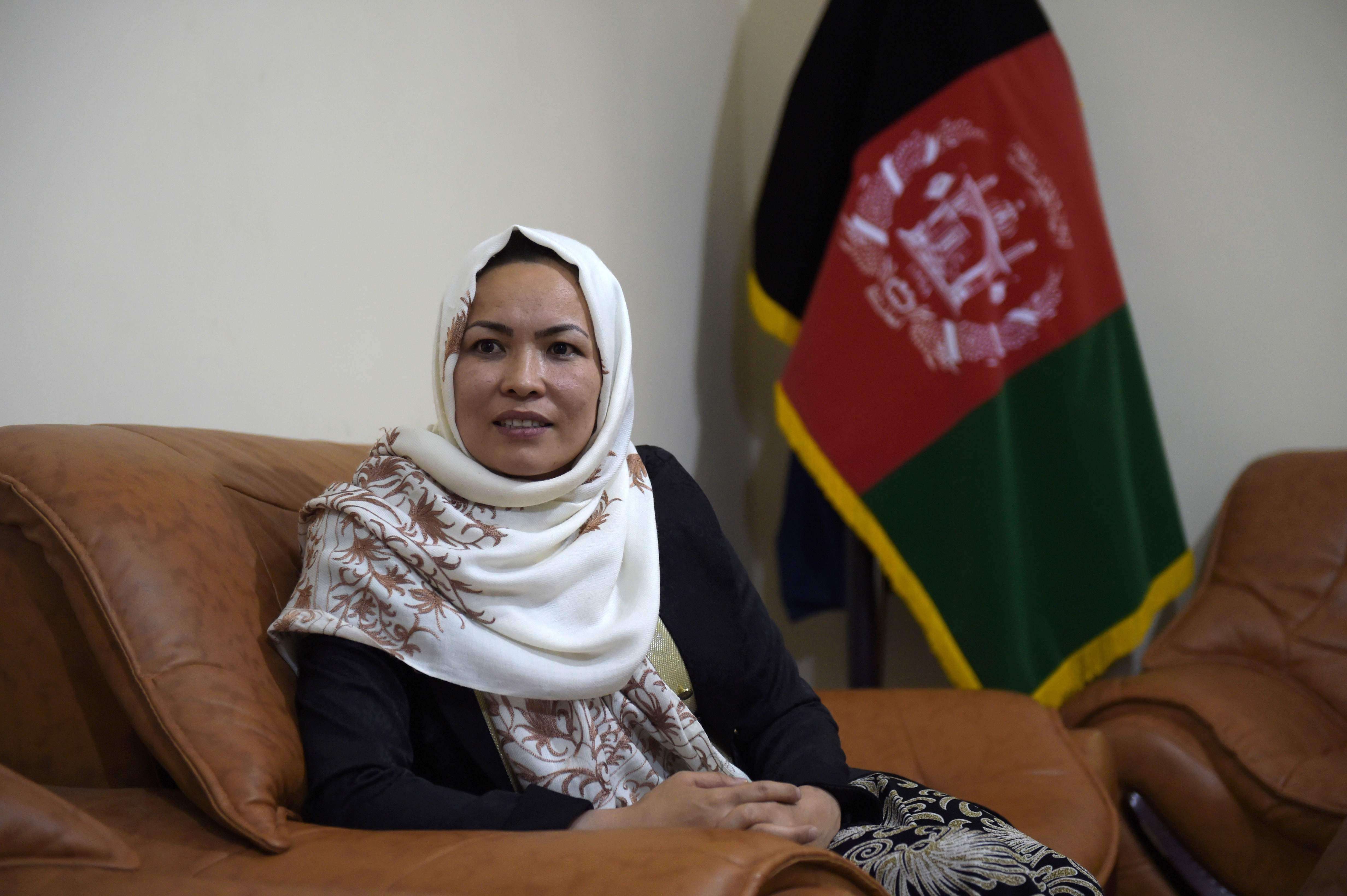 This photograph taken on May 10, 2016, shows Afghan Hazara tribe female governor of Daikundi province Masooma Muradi talking with an AFP reporter during an interview at her residence in Nili, capital of Daikundi province. Breaking new ground as Afghanistan's only female governor, Muradi's ascent to the top post in remote Daikundi province is a remarkable feat in Afghanistan, where stubborn patriarchal traditions are at odds with progressive ideas about a woman's place in the world. / AFP PHOTO / SHAH MARAI / TO GO WITH AFP STORY:  Afghanistan-unrest-politics-women FEATURE by ANUJ CHOPRA