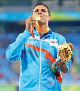 Rio de Janeiro : Gold medal winner India's Devendra Jhajharia poses at the presentation ceremony of the men's javelin throw of the Paralympic Games in Rio de Janeiro, Brazil on Tuesday. Jhajharia won gold and set a new world record. PTI Photo (PTI9_14_2016_000220B)