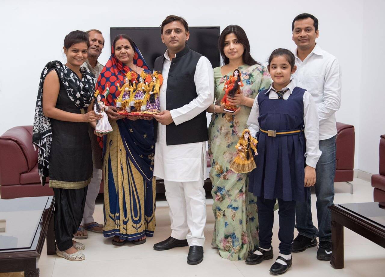 UP chief minister with famous exotic handmade doll makers from Kanpur.