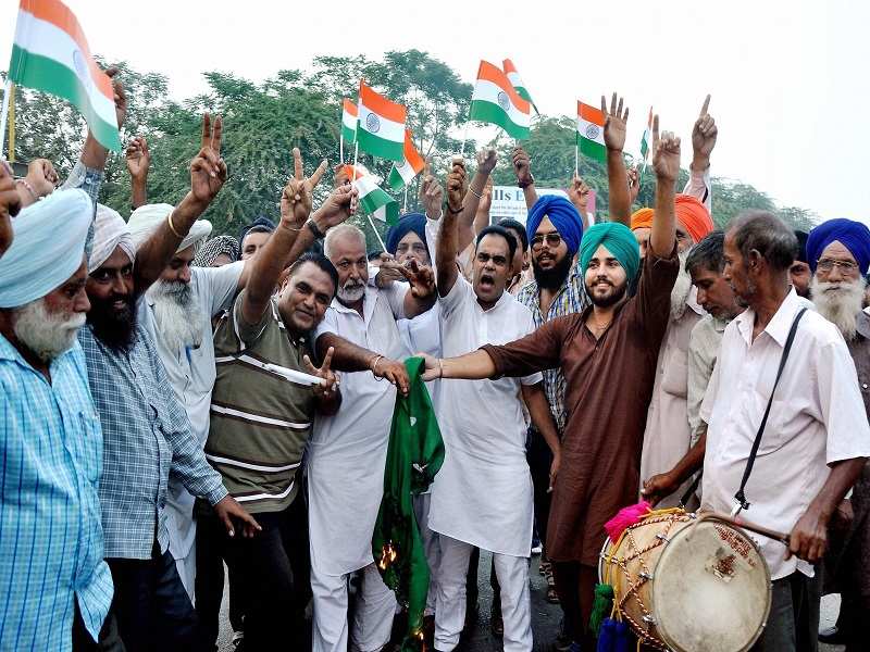 Patiala: People celebrate after Indian army's Surgical strikes along the Line of Control, in Patiala on Thursday. PTI Photo (PTI9_29_2016_000237B) *** Local Caption ***