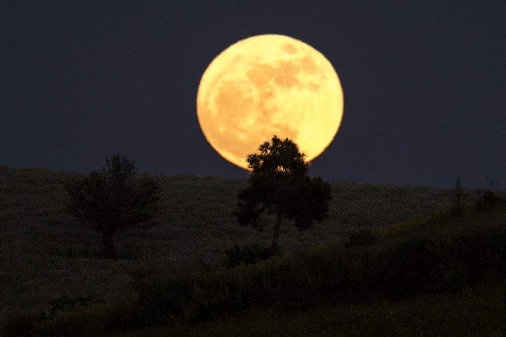 A 'supermoon' rises over Heho, Myanmar's Shan state. (AFP PHOTO / YE AUNG THU)