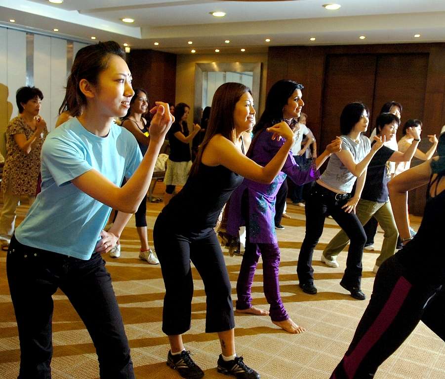 Members of the Sakuraki Japanese ladies Association take part in dancing session, also seen in Geetanjali Kirloskar at the Bollywood Dancing session part of the cultural workshop organised by India Japan Initiative in Bangalore on Thursday.