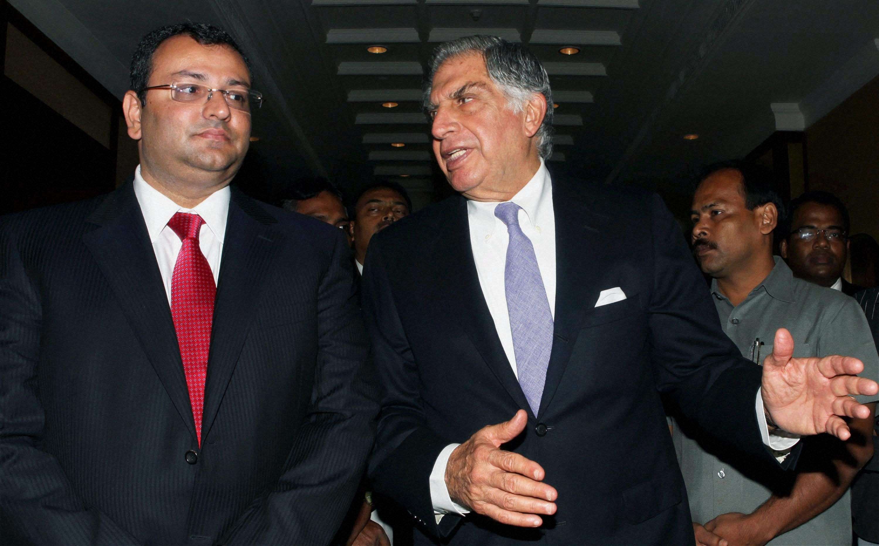 New Delhi: **FILE** File photo of Ratan Tata (L) with Cyrus Mistry. Tata Sons on Monday removed Cyrus Mistry as its Chairman, nearly four years after he took over the reins of the group. Ratan Tata makes a comeback, taking over as the company's interim boss for 4 months. PTI Photo (STORY DEL66)(PTI10_24_2016_000163B)