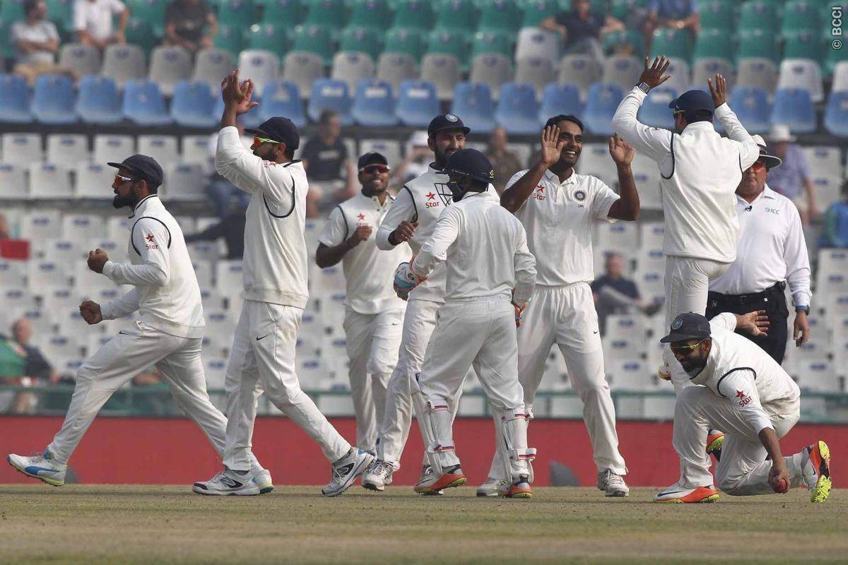 Jayant Yadav of India with his team mates celebrates the wicket of Jos Buttler of England during day 4 of the third test match between India and England held at the Punjab Cricket Association IS Bindra Stadium, Mohali on the 29th November 2016. Photo by: Deepak Malik/ BCCI/ SPORTZPICS