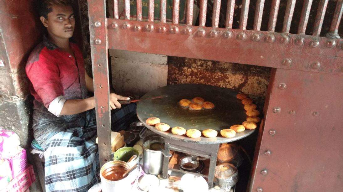 Gateway to good things: Those aloo tikkis (made by a worker) have helped Gopal educate his kids well. His family includes an architect, an MBA and a PhD student