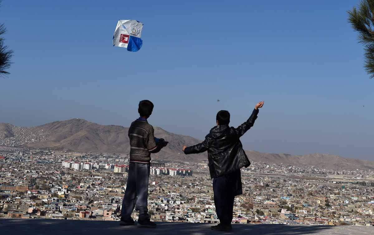 Afghan children fly kites during a kite festival in Kabul. (AFP / Wakil Kohsar)