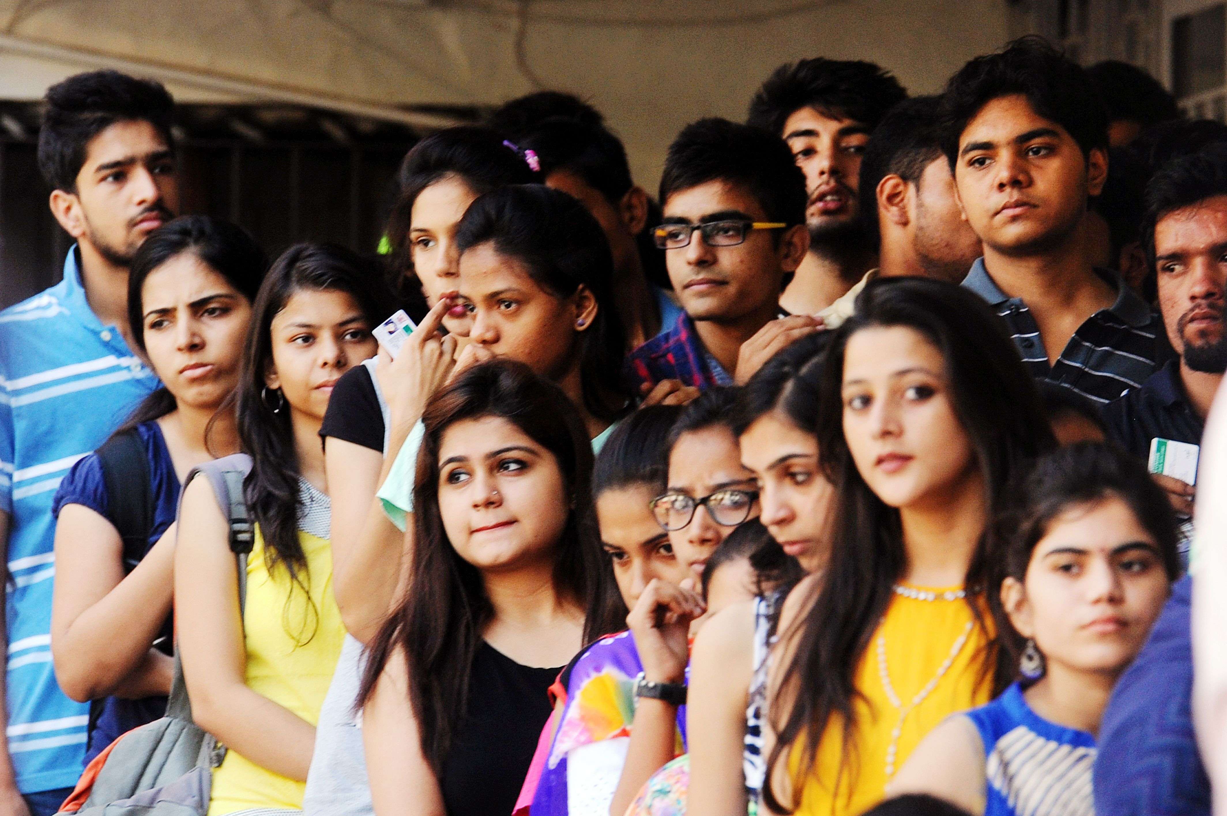 Students in queue to cast their vote in Delhi University election on Friday. --- Piyal Bhattacharjee