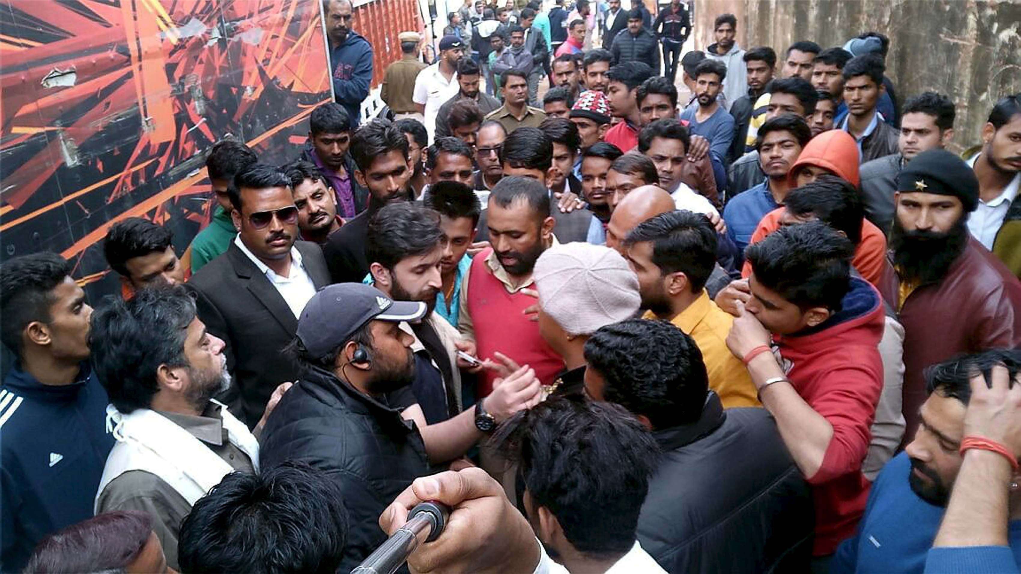 Jaipur: Karni Sena activists protest against the shooting of Sanjay Leela Bhansali's upconimg film 'Padmawati' alleging depiction of 'wrong facts' in it at Jaigarh fort in Jaipur on Friday. PTI Photo (PTI1_27_2017_00231B)