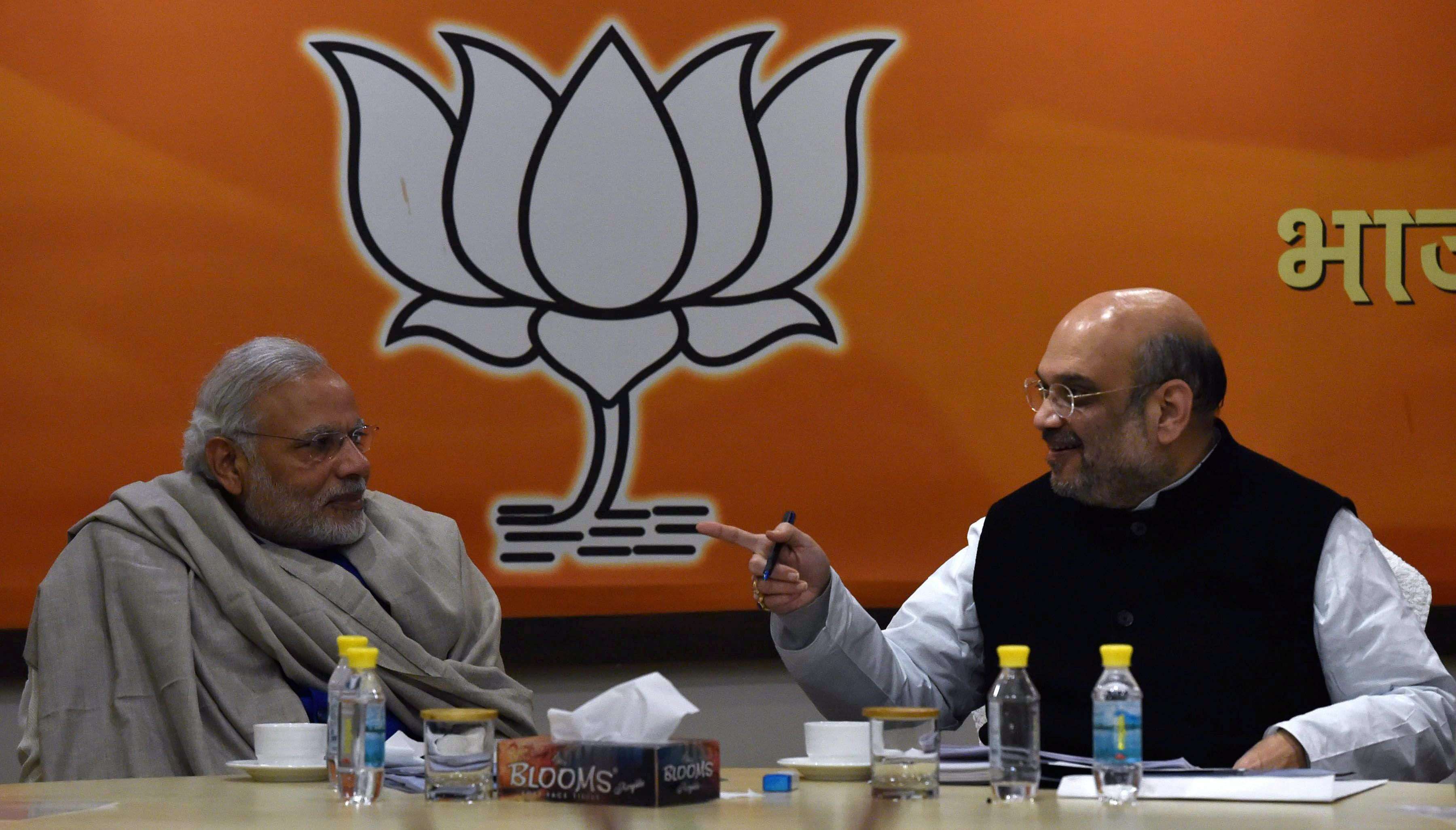 New Delhi: Prime Minister Narendra Modi and BJP President Amit Shah during the Central Election Committee (CEC) meeting for Uttar Pradesh state elections at BJP headquarters in New Delhi on Sunday. PTI Photo by Vijay Verma (PTI1_15_2017_000234B)