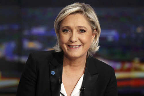 Marine Le Pen, French National Front (FN) political party leader and candidate for French 2017 presidential election, poses prior to an interview on the prime time broadcast of French TV channel TF1, in Boulogne-Billancourt. (Reuters Photo)