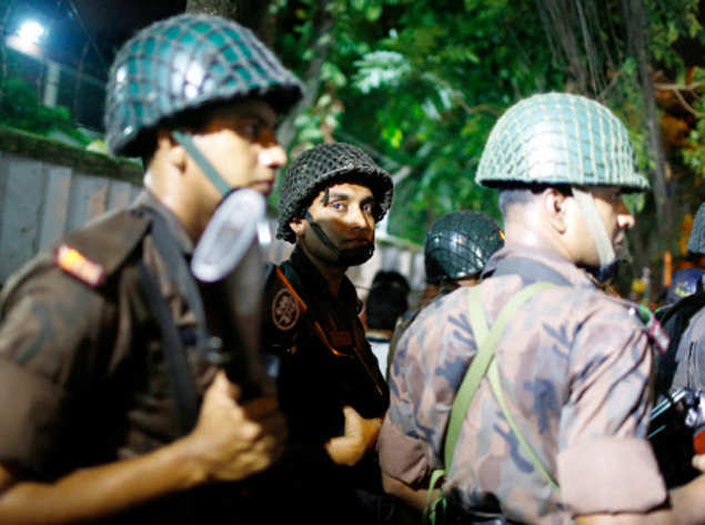 Bangladeshi security forces outside the cafe in Dhaka