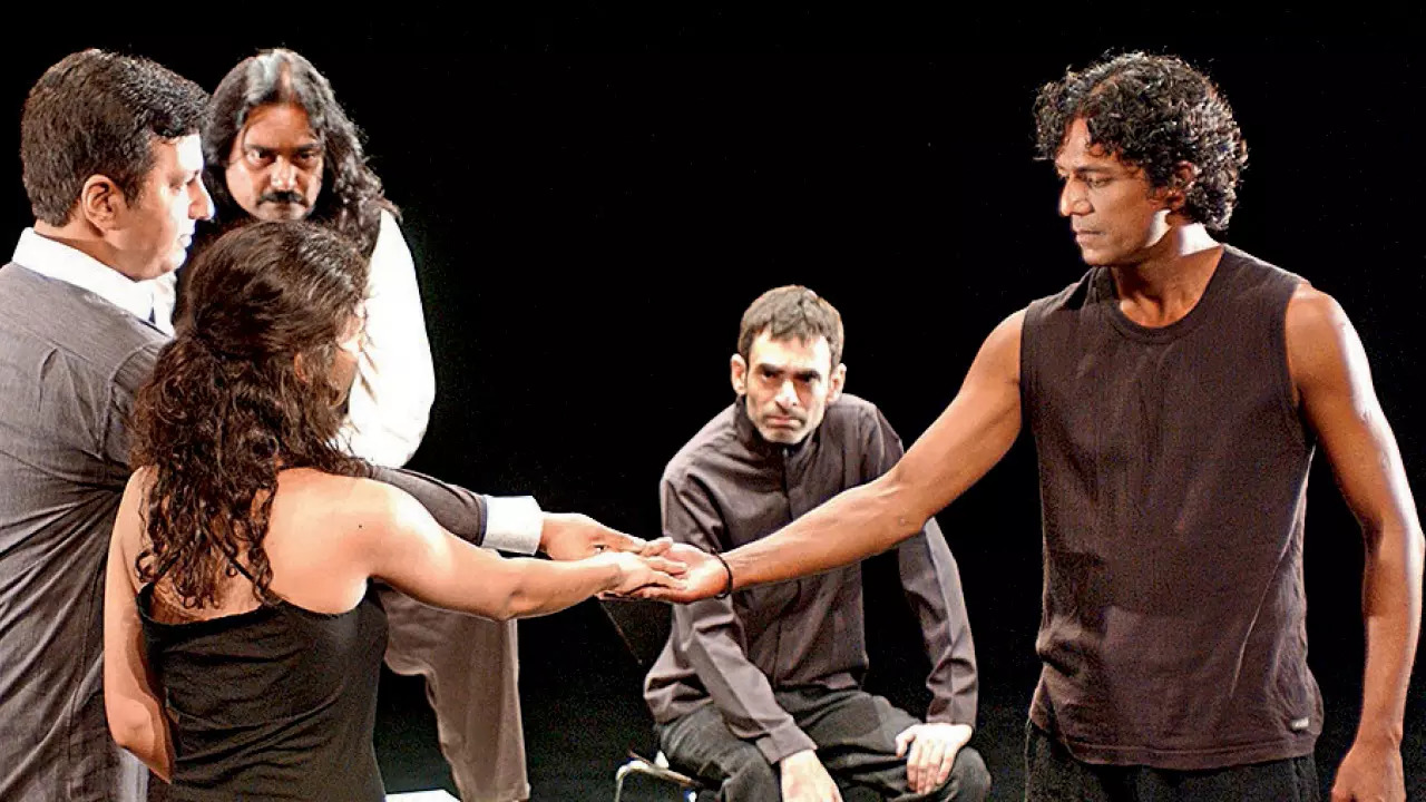 Adil (right) in the theatrical production of Othello: A Play in Black .and White. Adil shared that the actor who played Desdemona, Kristen Jain, is his wife now (credit: roystenabel.com)