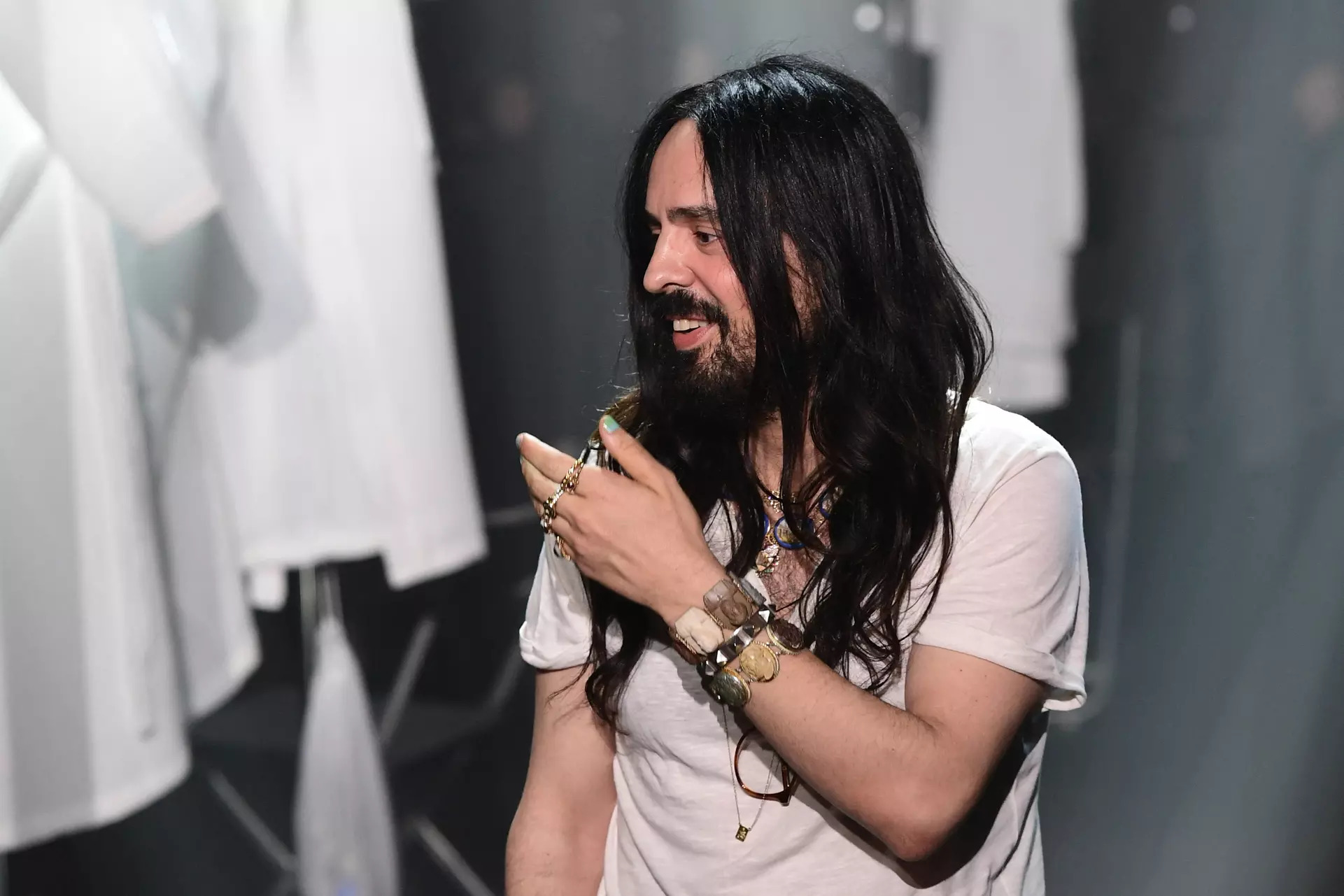 Italian fashion designer Alessandro Michele acknowledges applause following the presentation of Gucci&#39;s Women Fall - Winter 2020 collection on February 19, 2020 in Milan.