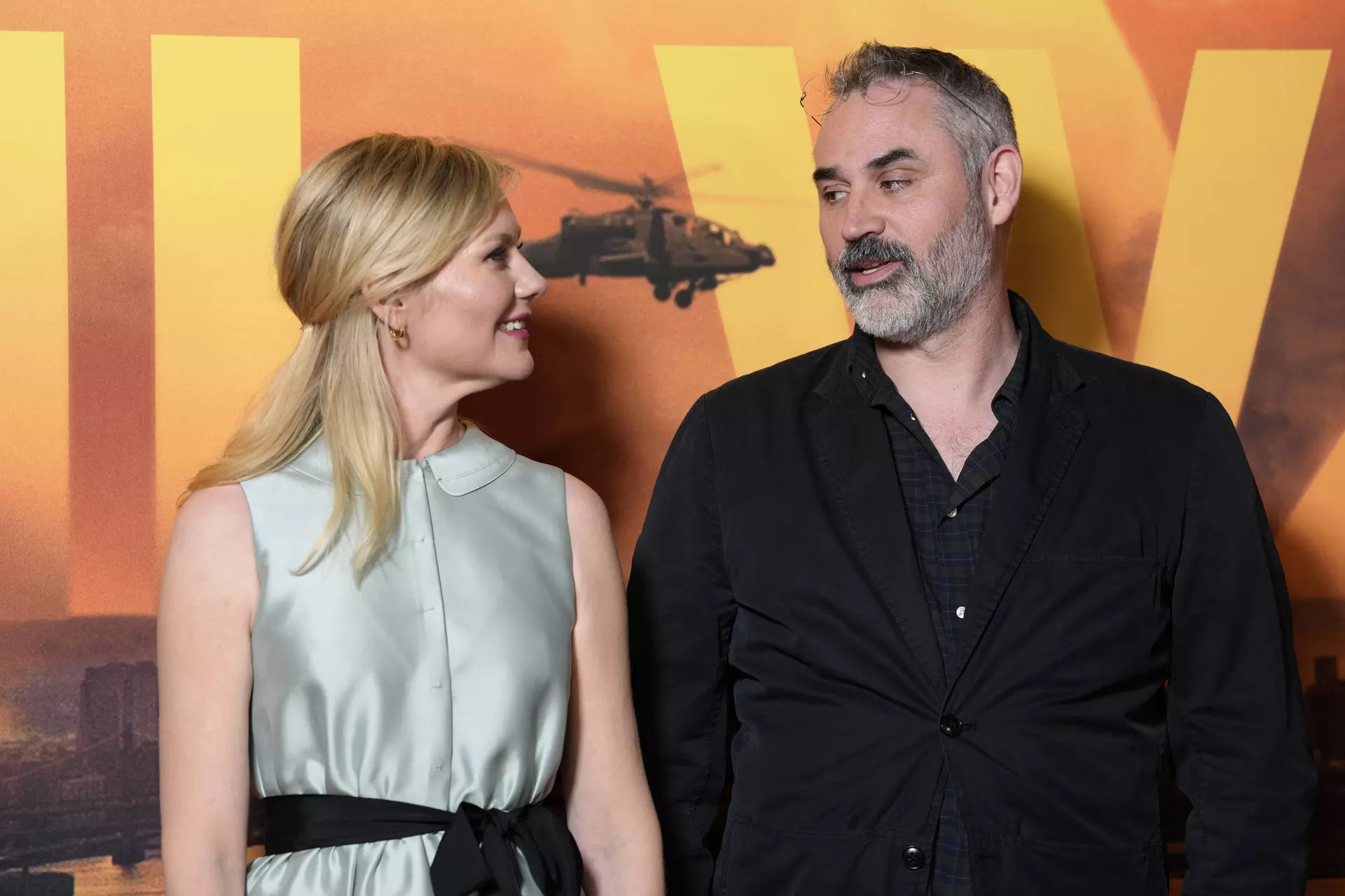 Kirsten Dunst, left, and Alex Garland at the special screening of the film &#39;Civil War&#39; in London, on Tuesday, March 26, 2024. (Scott A Garfitt/Invision/AP)