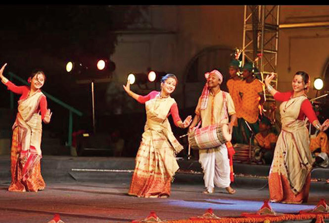 Bidisha performing a Bihu dance (second from left)
