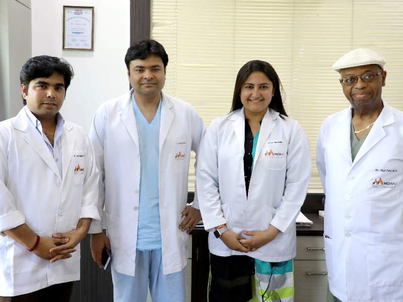 Mohak members Dr. Mathur, Dr. Fobi &amp; Dr. Tiwari with Dr. Bhandari at OPD
