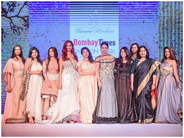 Showstoppers Dr Kavita Gupta (IAS Textile Commissioner) and Neetu Chandra, with designer Tasneem Merchant and Abha Singh, along with other women achievers