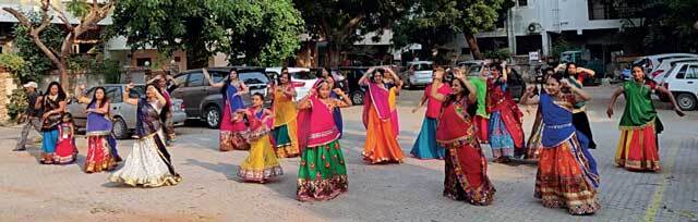 Residents of Ashok Nagar Society match their steps with dancers Riya and Purva. They have been taking garba lessons for the past 10 days Residents of Ashok Nagar Society match their steps with dancers Riya and Purva. They have been taking garba lessons for the past 10 days