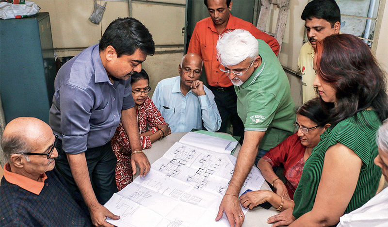 A meeting in progress at Shantaprabha in Goregaon to study the self-redevelopment plans