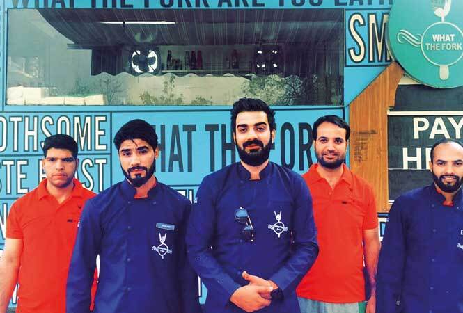 Mujeeb Shah (third from left), with his team FOOD-TRUCK-Srinagar-(2)