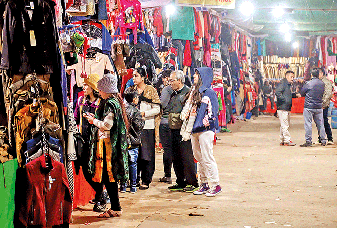 Noida's Tibetan Market a hit with young shoppers looking for affordable woollens | Noida News - Times of India